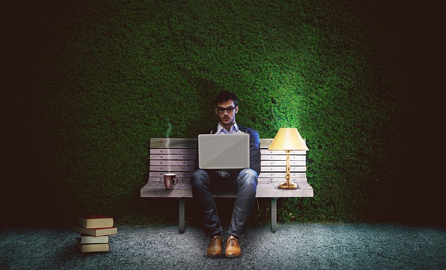 guy sitting on a bench